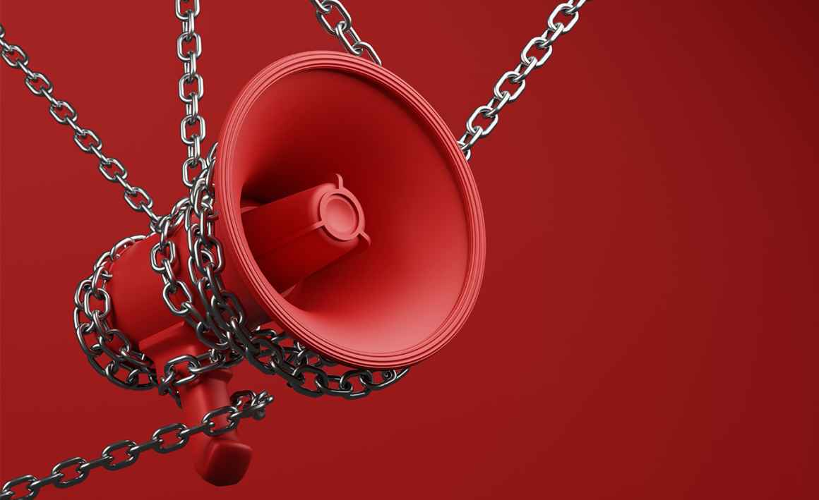 Chained bullhorn on red background